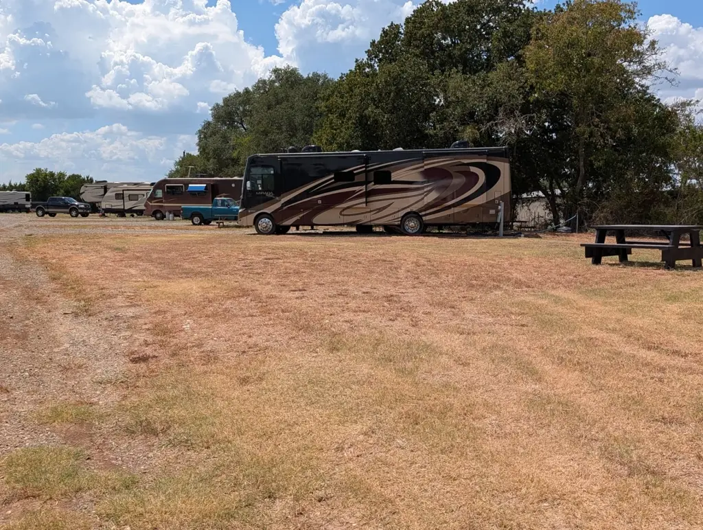 Large motorhome on a spacious RV site at Journey's RV Park in Temple, Texas